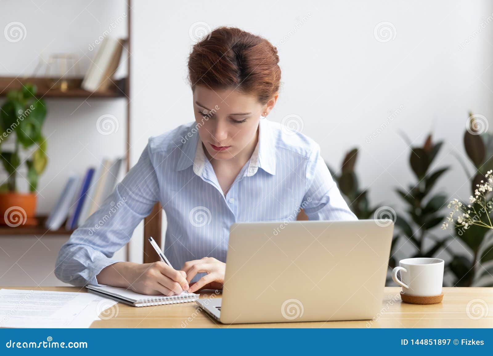 Focused Millennial Business Woman Office Worker Make Notes Planning ...