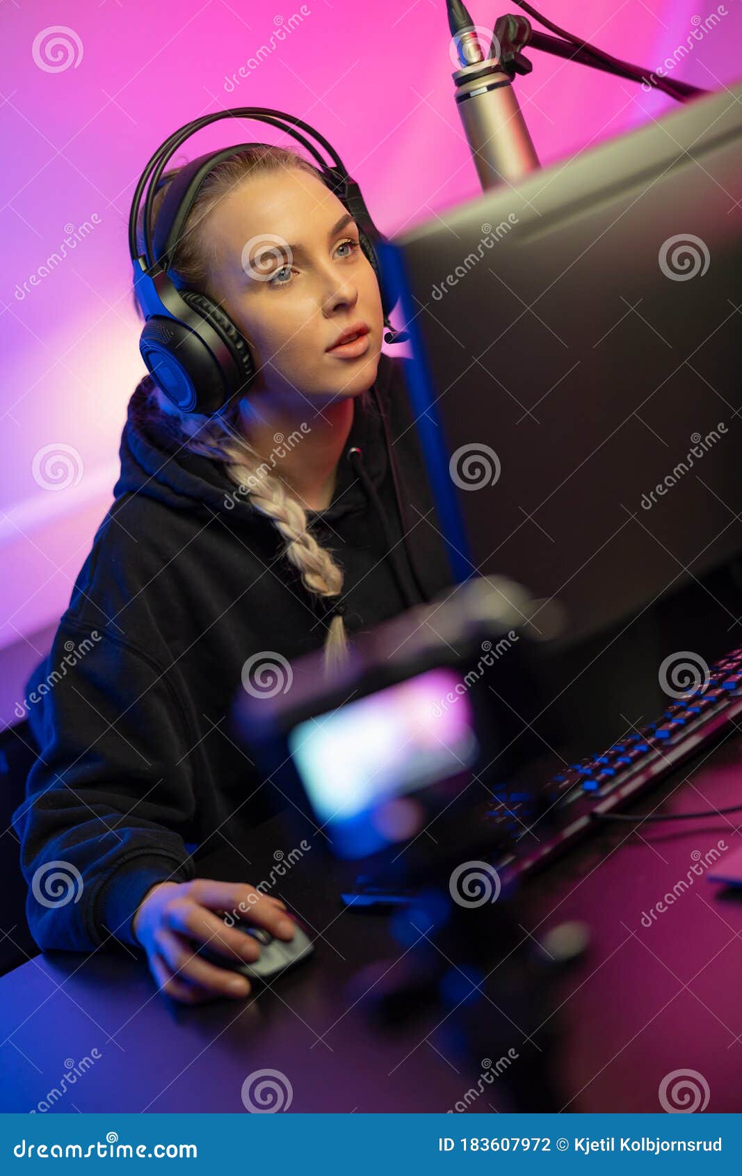 Happy and Beautiful Blonde Gamer Girl Playing Online Video Game on Her  Personal Computer Stock Photo by kjekol