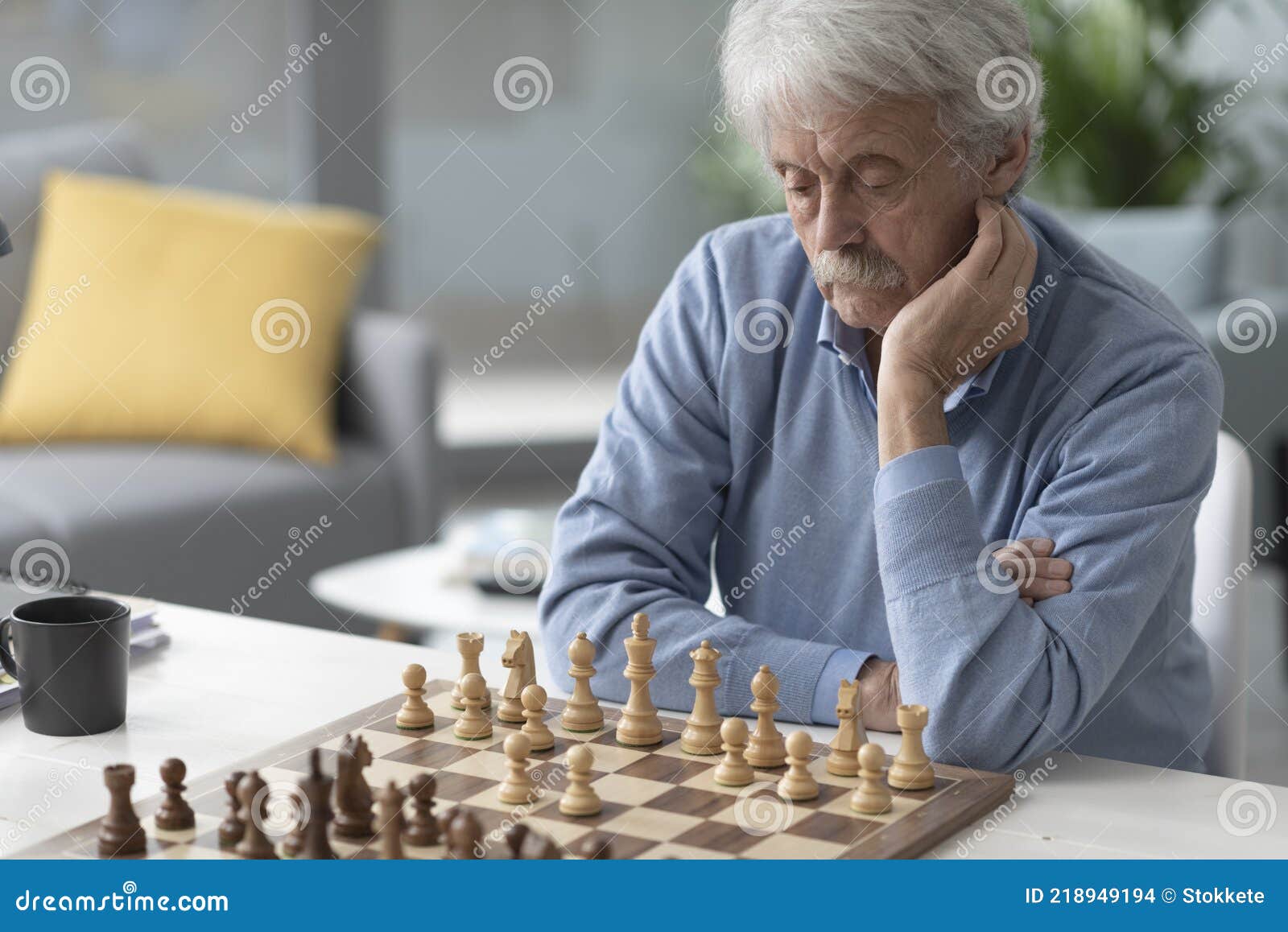 Premium Photo  Young bearded man in sunglasses sitting on a wooden park  bench planning his next chess move