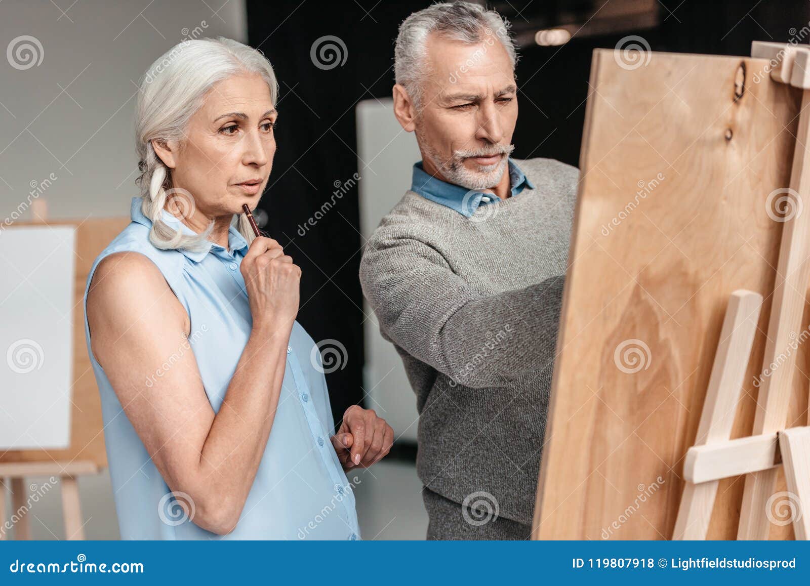 Focused Senior Students Painting Together Stock Photo - Image of teach