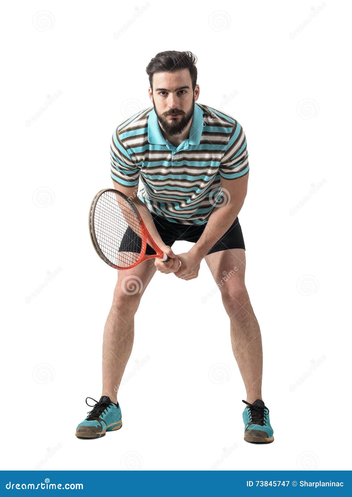 Focused Young Tennis Player Waiting To Return Serve Holding Racket with ...