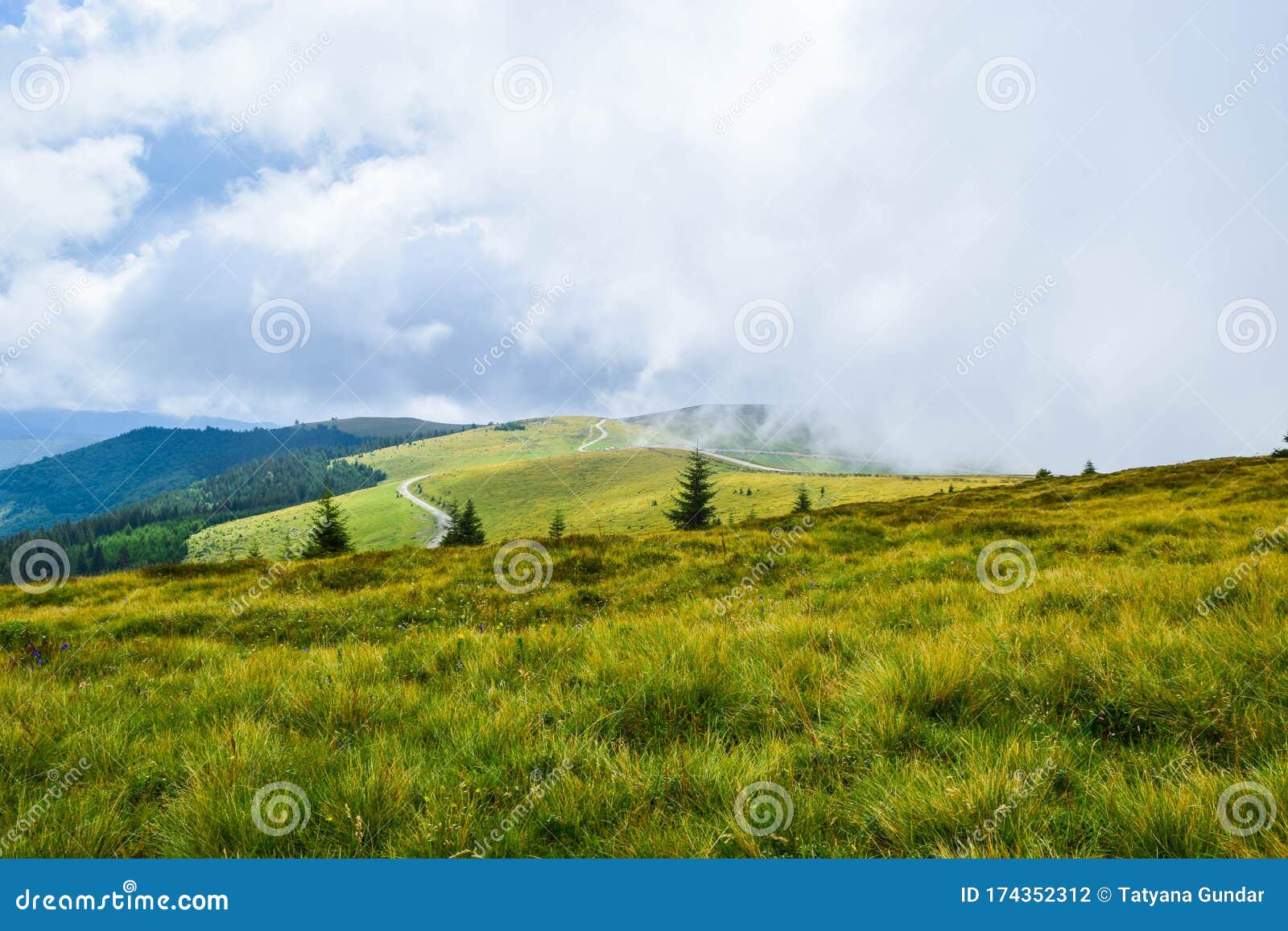 fog and low clouds over the transalpina serpentines road dn67c. this is one of the most beautiful alpine routes in romania