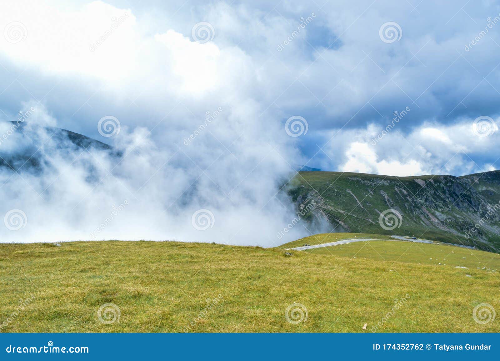 fog and low clouds over the transalpina serpentines road dn67c. this is one of the most beautiful alpine routes in romania