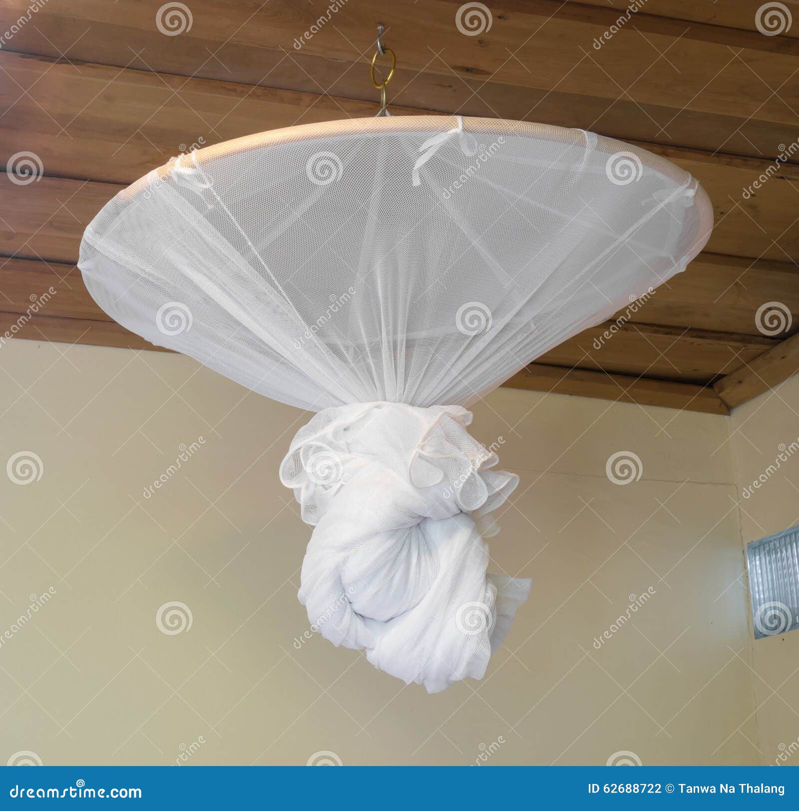 Fold Mosquito Net Over a Bed in Bedroom. Stock Photo Image of health
