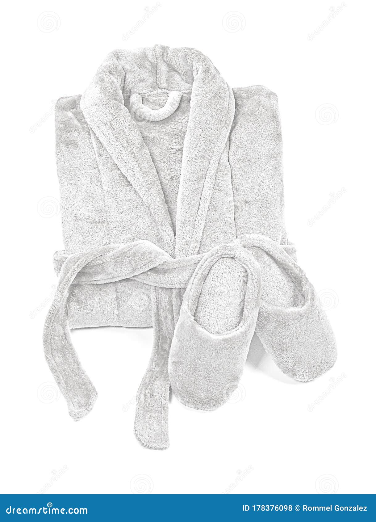 Folded Bathrobe, and Slippers Isolated on White, Top View. Stock Photo