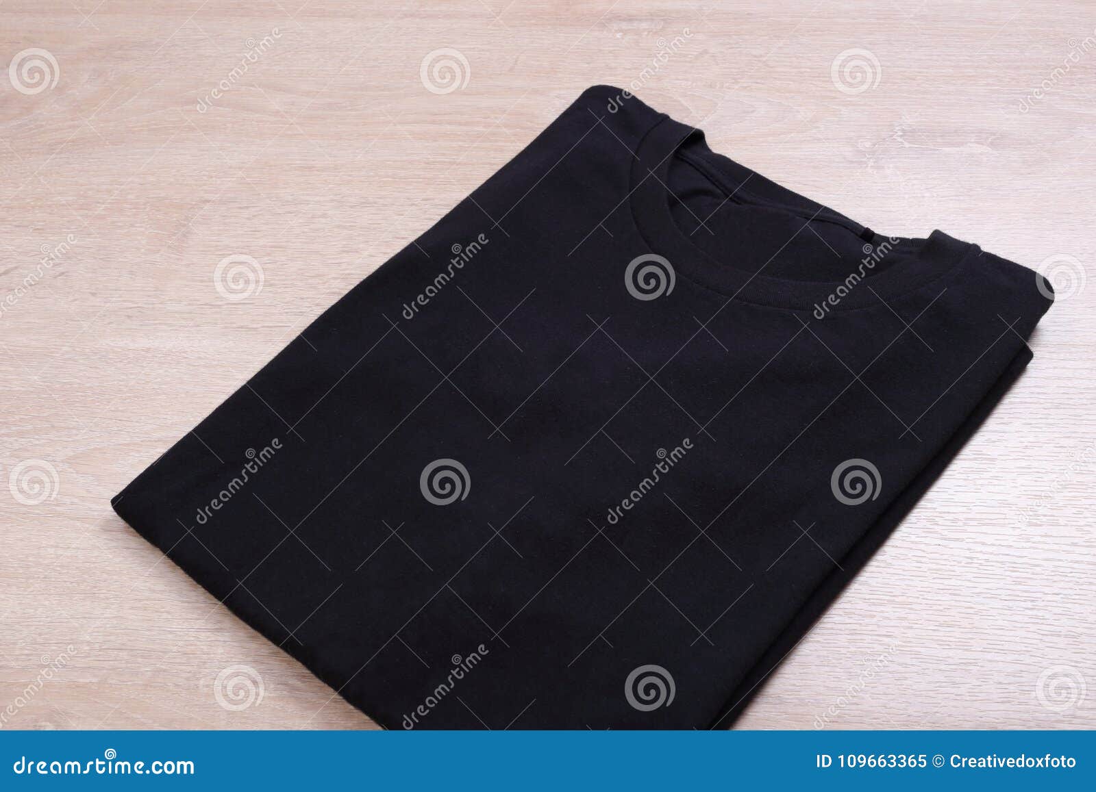 Folded Black Shirt on Wooden Background Stock Image - Image of template ...