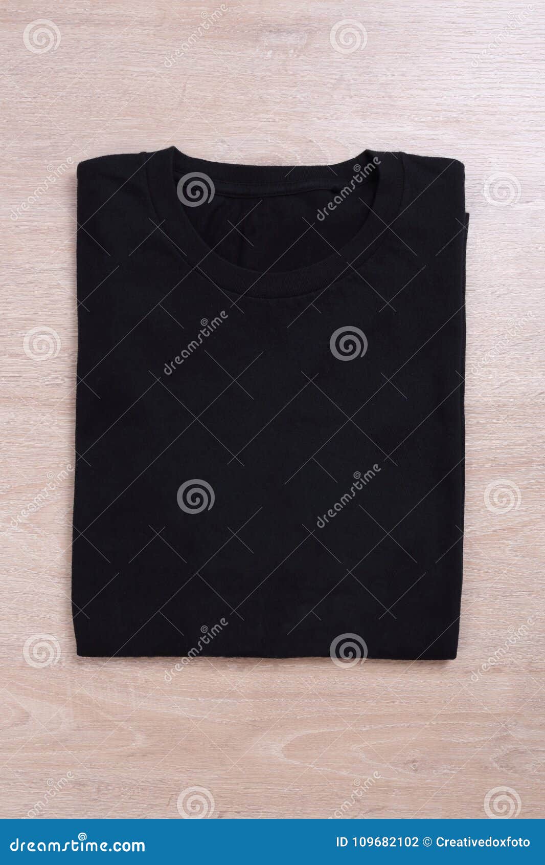 Folded Black Tshirt on Wooden Background Stock Photo - Image of wear ...