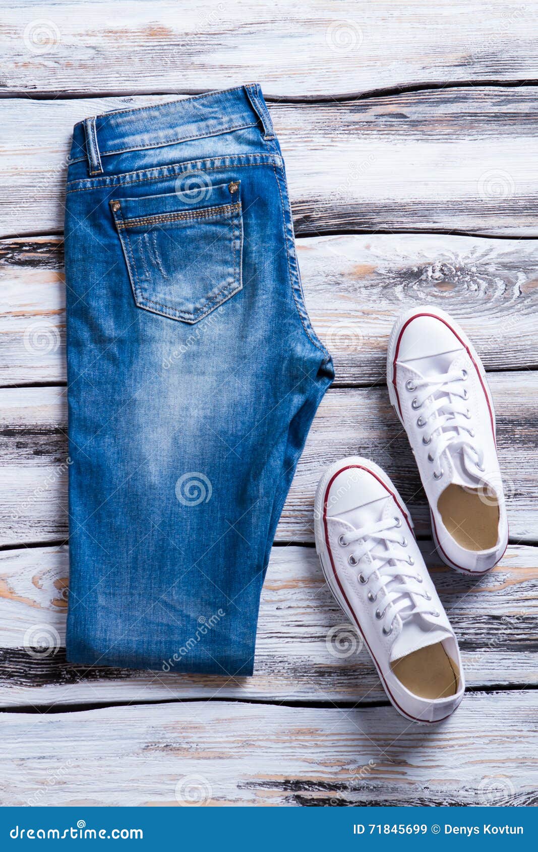 Folded Jeans and White Shoes. Stock Image - Image of collection ...