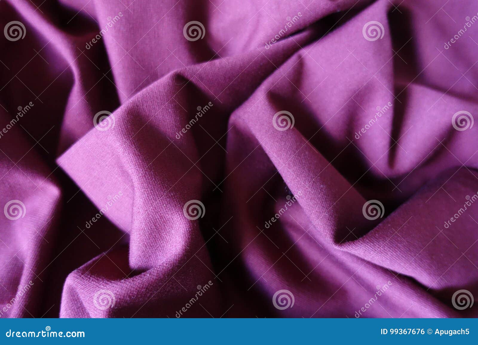 folded reddish violet viscose stockinette fabric