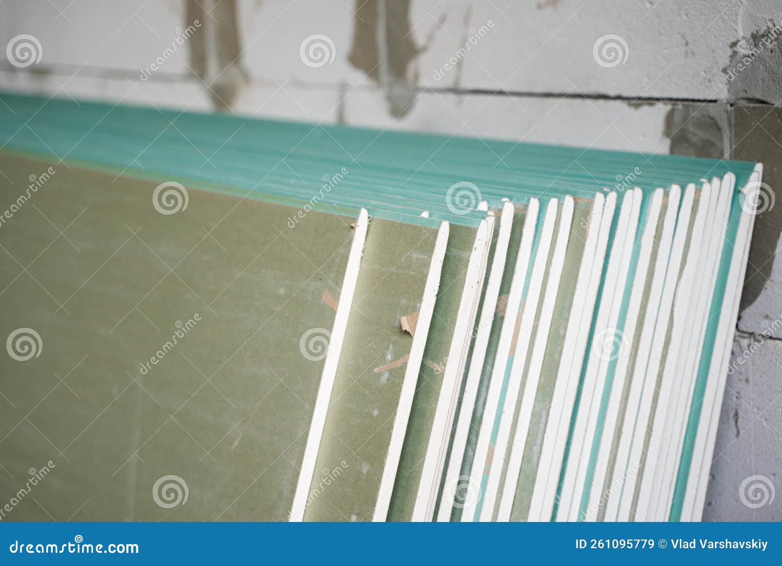 Folded Sheets of Moistureresistant Drywall Closeup. Building