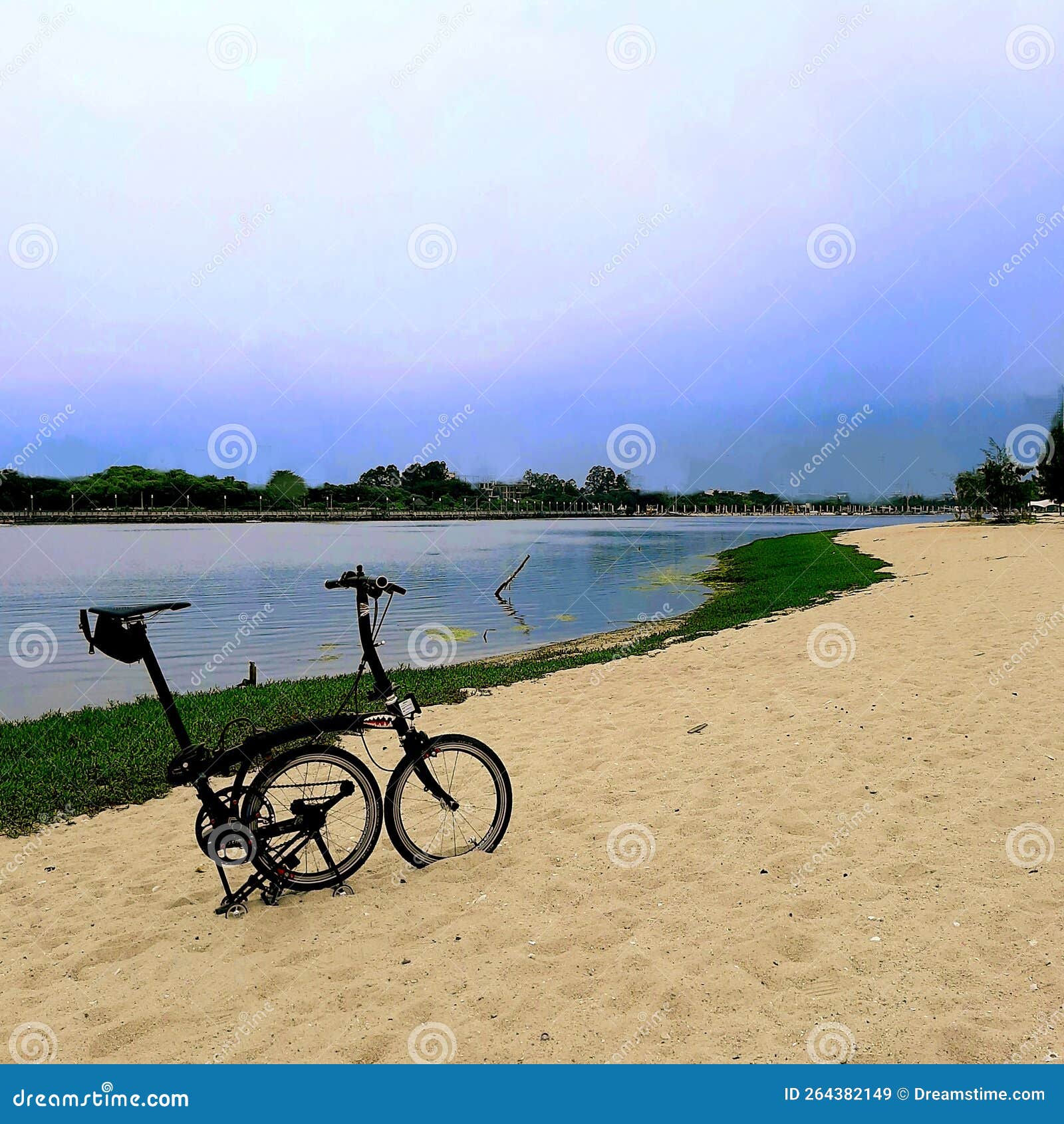 Folding bike at the beach stock image. Image of walkway 264382149