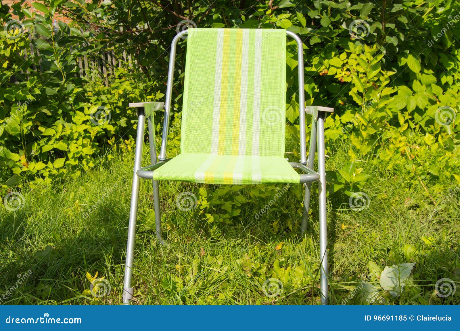 Folding Chair for Camping on Green Grass Stock Image Image of