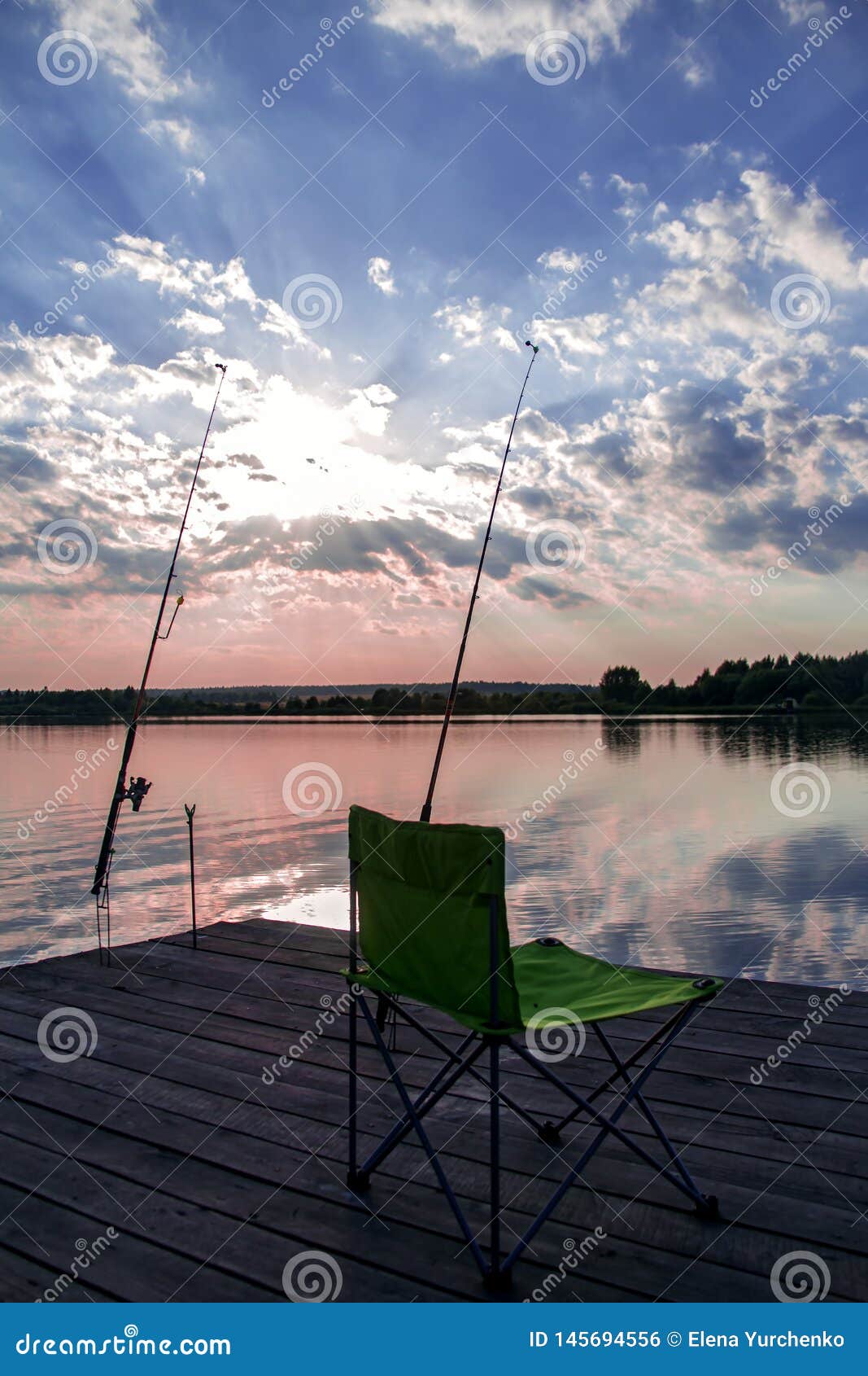 Folding Chair and Fishing Rod on Lake Stock Photo - Image of