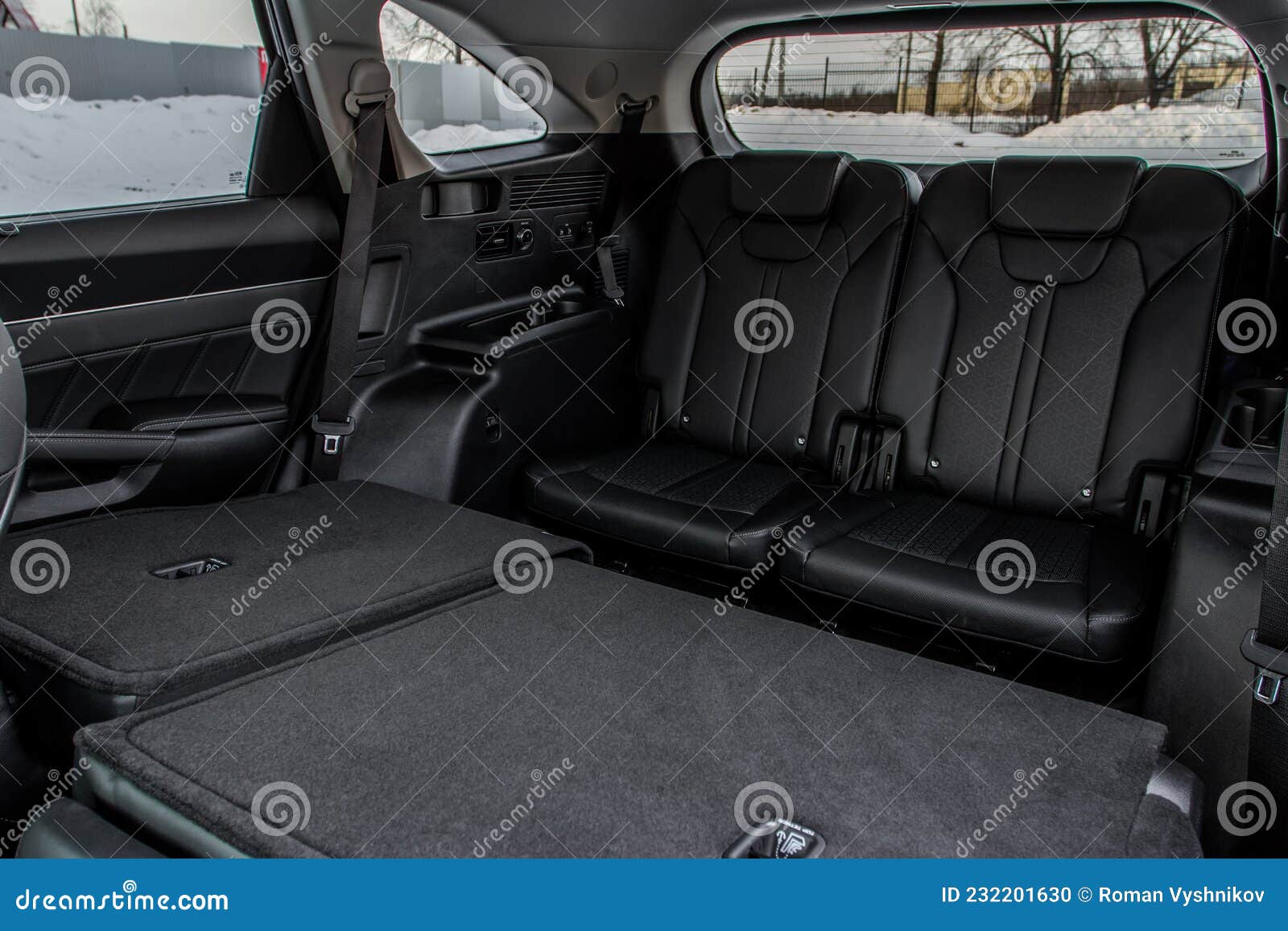 Folding Seats and a Cargo Space Inside Suv Car. Modern Car Interior