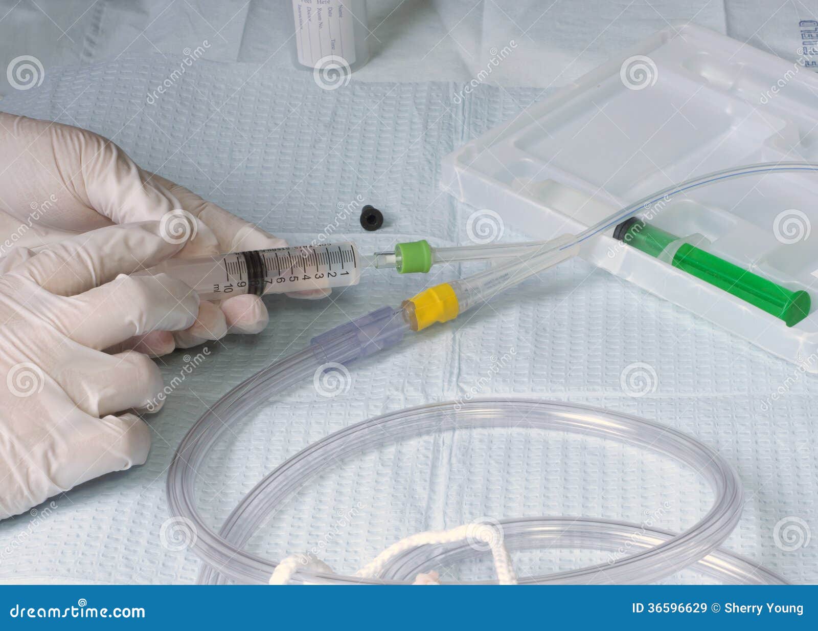 foley catheter urinary sterile syringe urine nurse inflate balloon fill using water