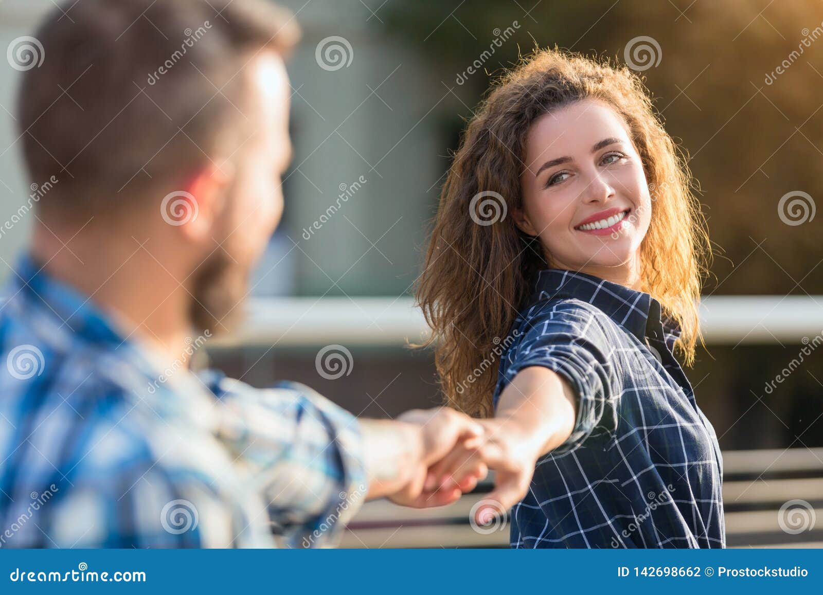girlfriend and boyfriend holding hands