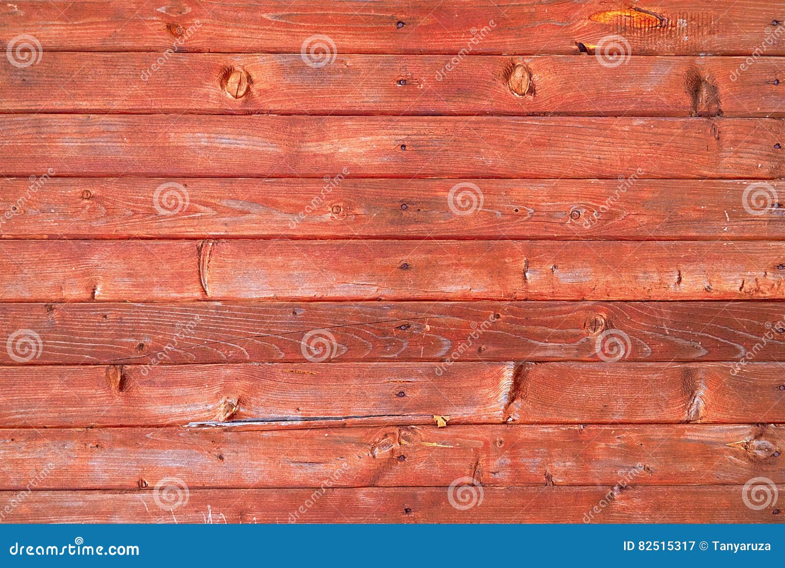 Fondo delle plance di legno marroni. Una parete delle plance di legno marroni