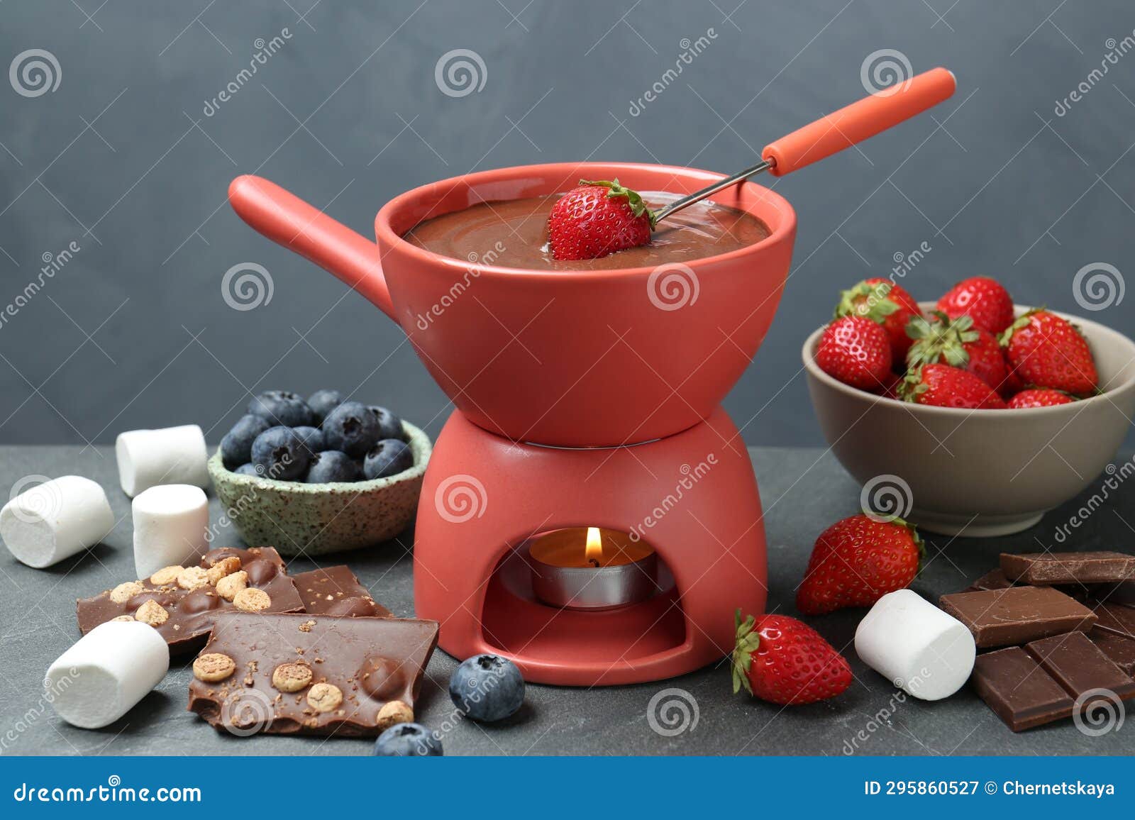 Fondue Pot with Melted Chocolate, Marshmallows, Fork and Different