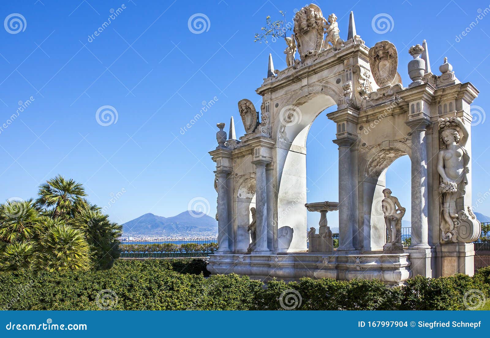 at the fontana del gigante fountain in naples italy with vesuvius in the background