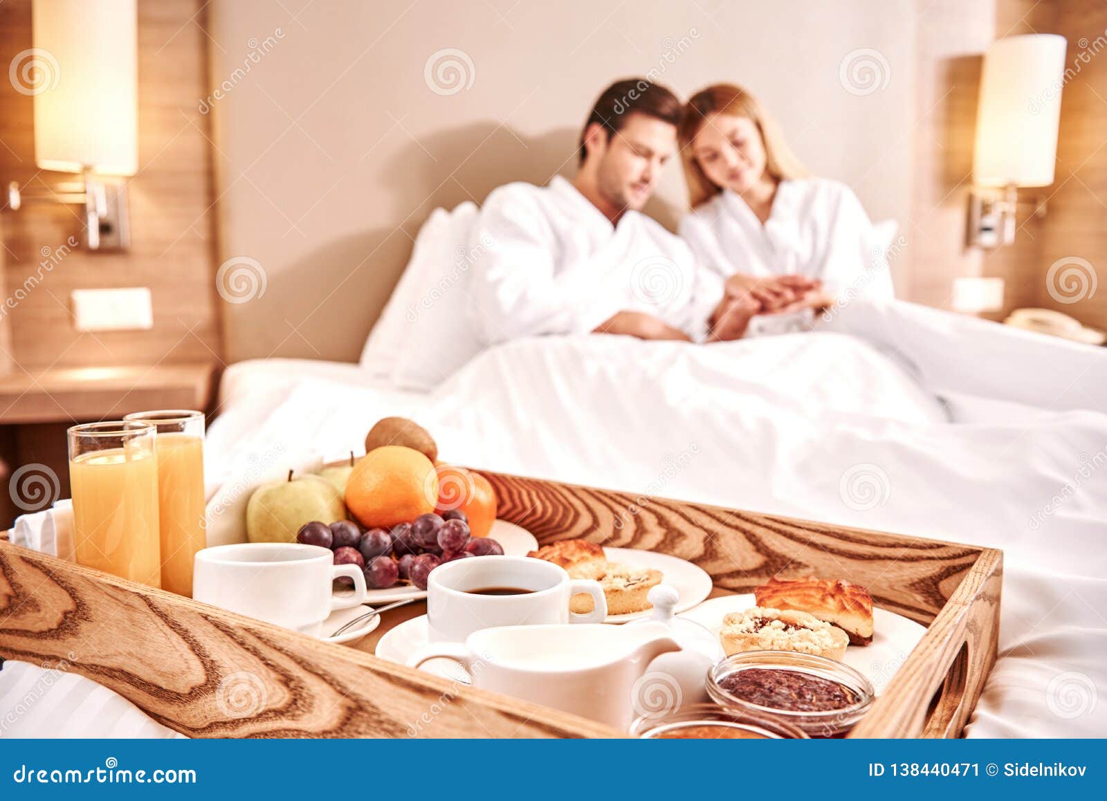 Food In A Bed Couple Are Hugging In Hotel Room Bed Stock Image Imag
