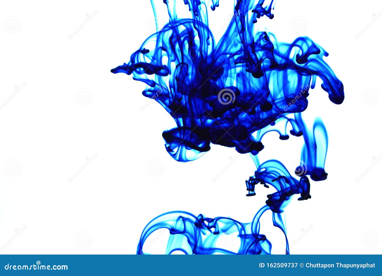 Food Coloring Drops in Water White Background Copy Space Stock Image