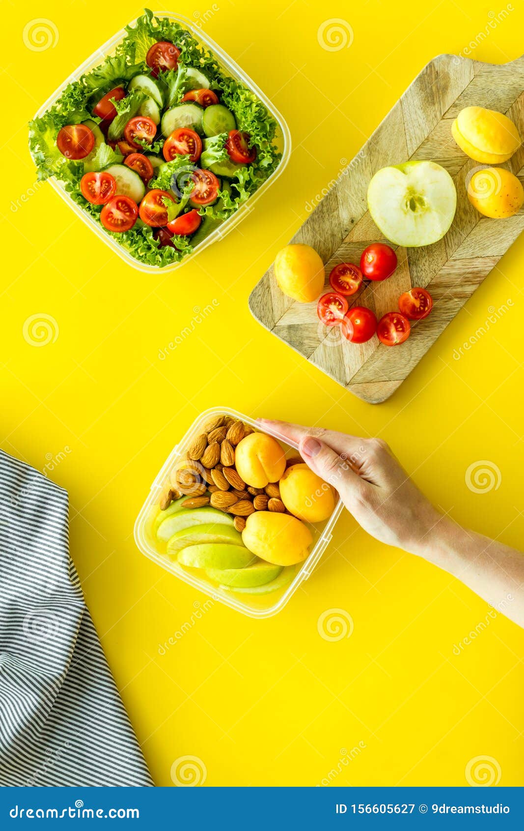 Download Food Container With Nuts In Hand Salad On Yellow Background Top View Mockup Stock Image Image Of Office Container 156605627 Yellowimages Mockups