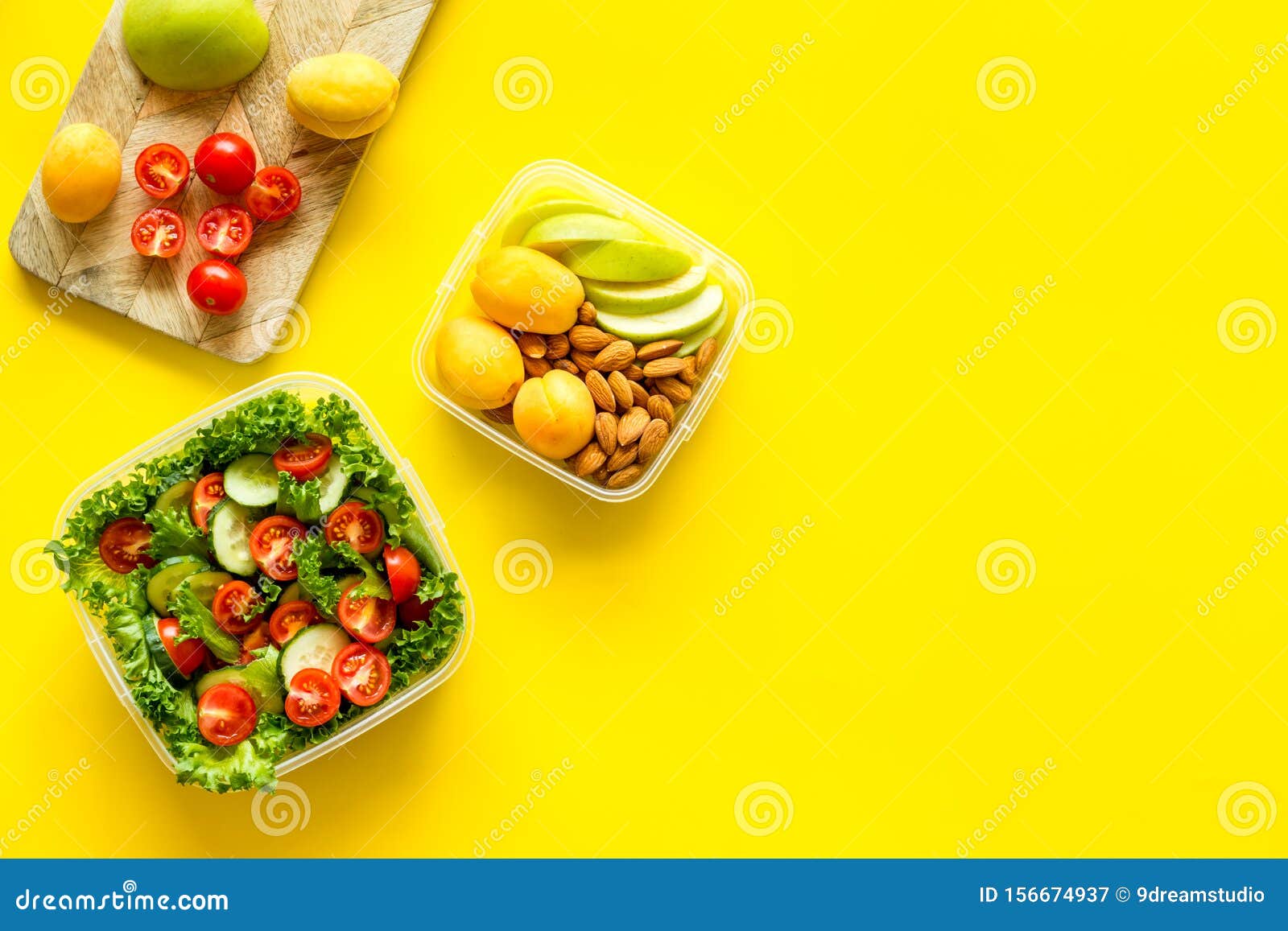 Download Food Container With Salad And Nuts, Fruit On Yellow Background Top View Mockup Stock Image ...