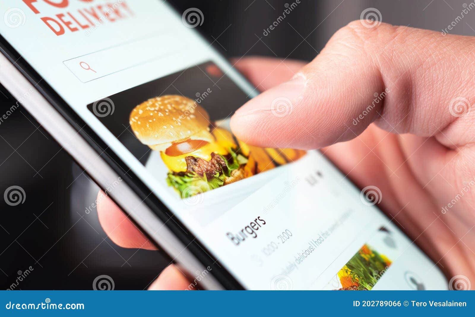 food delivery app order with phone. online mobile service for take away burger and pizza. hungry man reading restaurant menu.