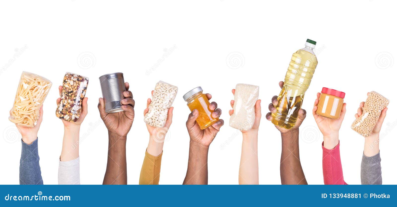 food donations in hands  on white background