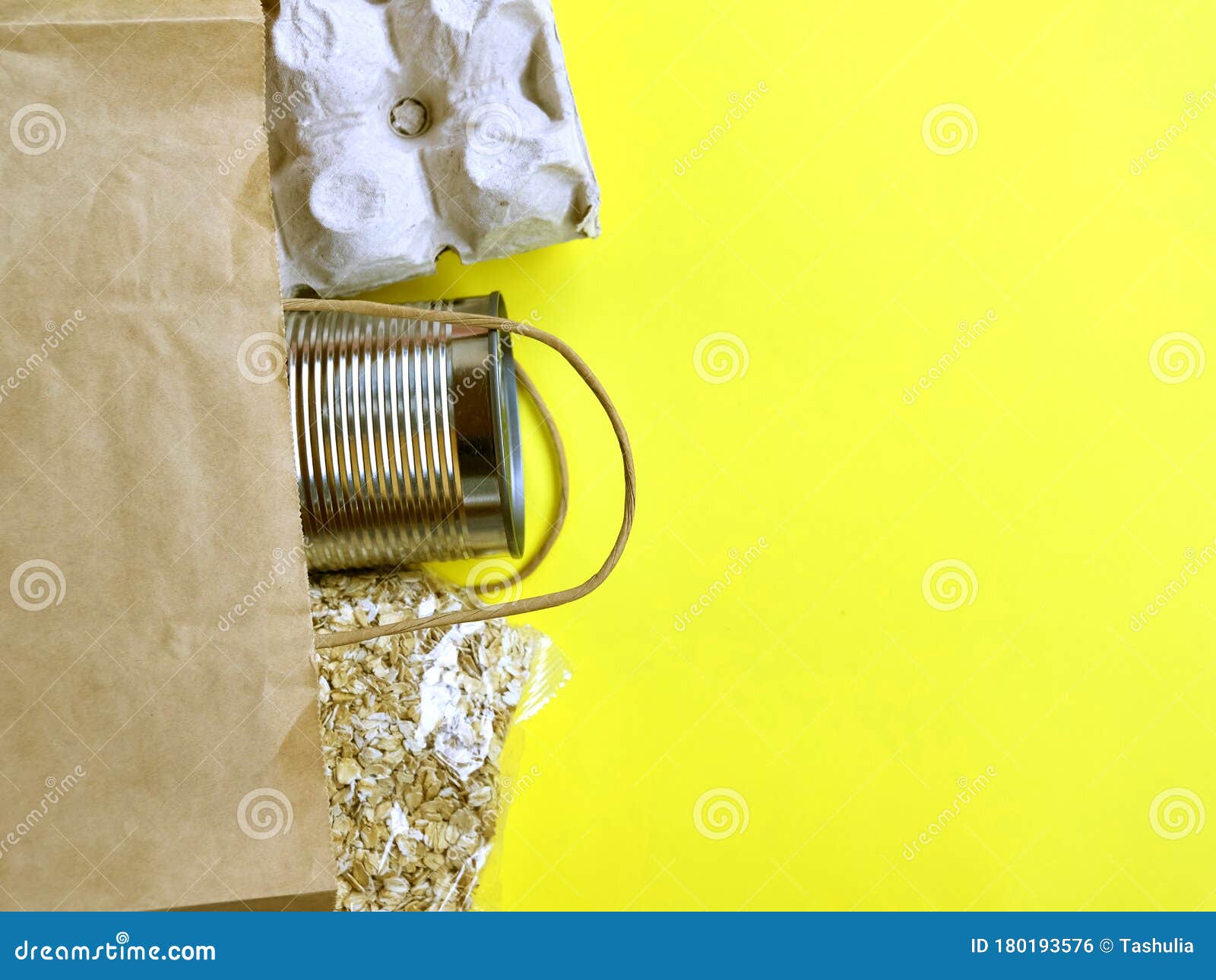 Download Food In A Paper Bag Eggs Canned Food And Oat Groats On A Yellow Background Stock Photo Image Of Poverty Necessities 180193576 Yellowimages Mockups