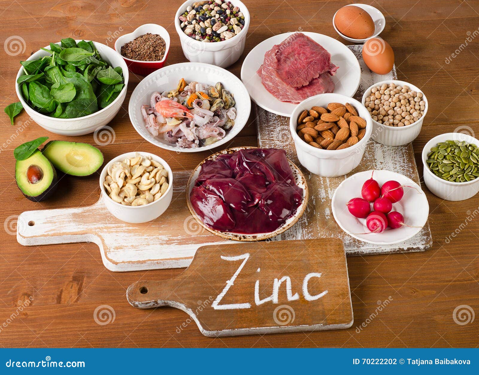 foods with zinc mineral on a wooden table.