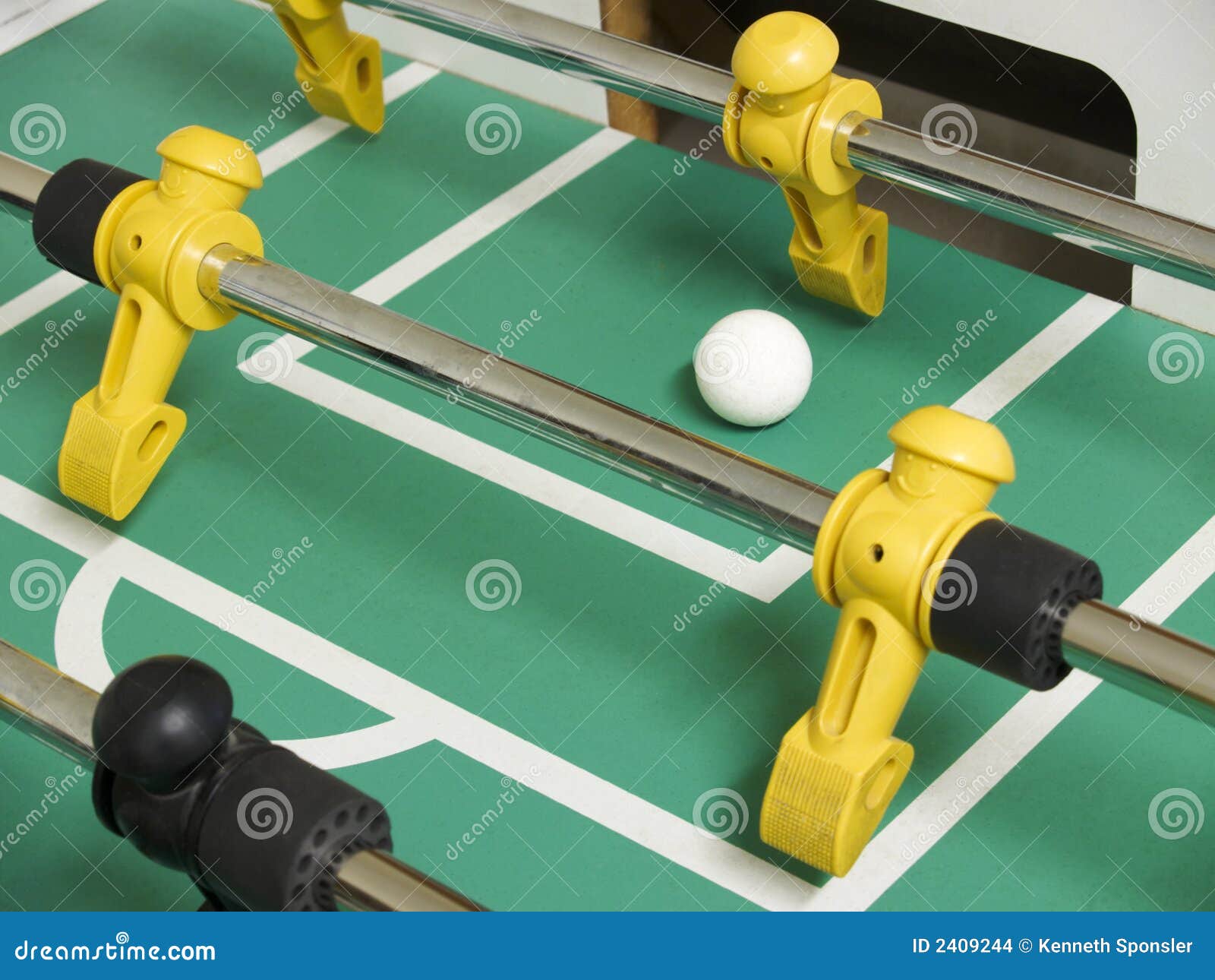 Foosball closeup stock photo. Image of black, game, green 2409244