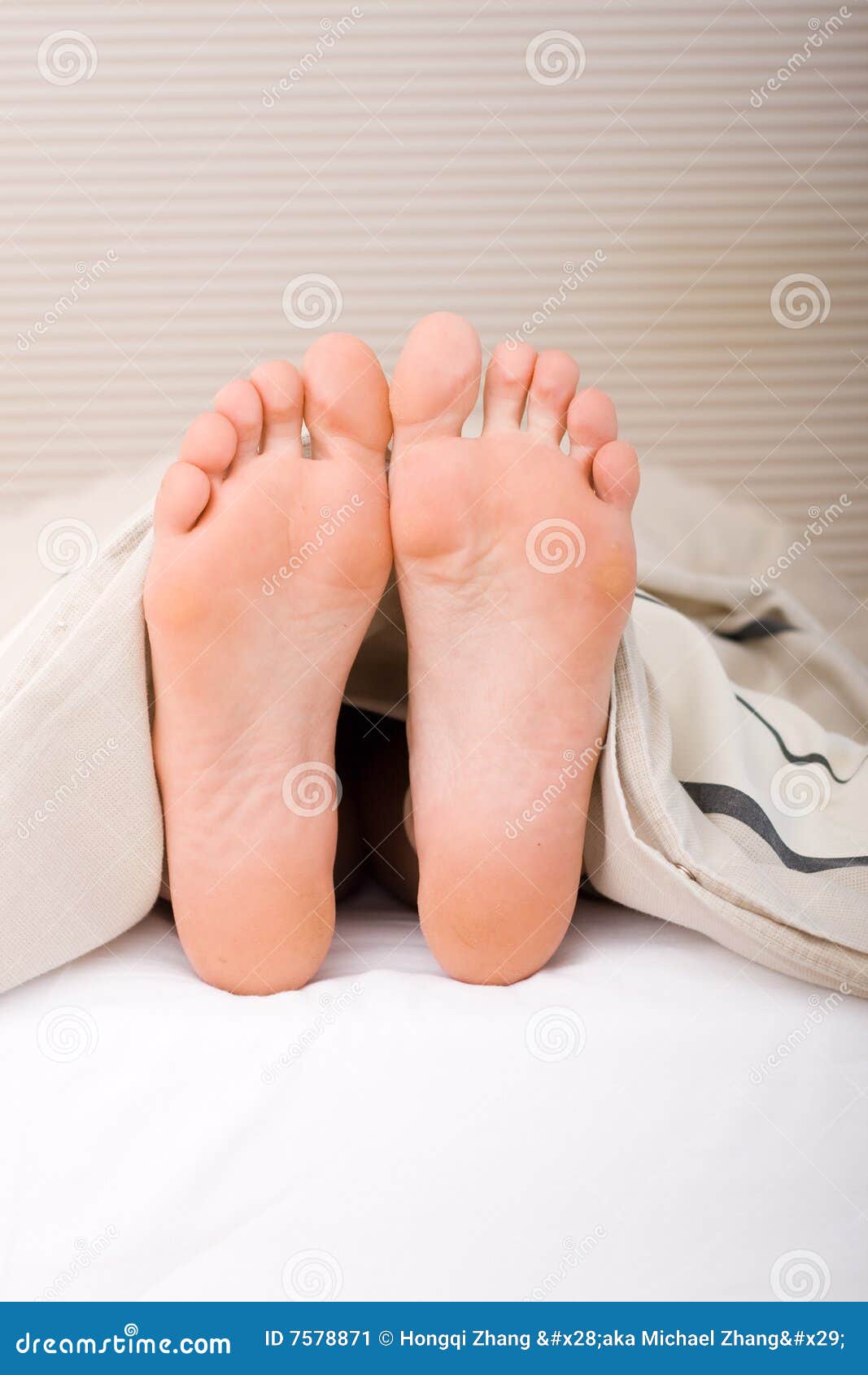 Foot on bed stock image. Image of relax, female, pair 7578871