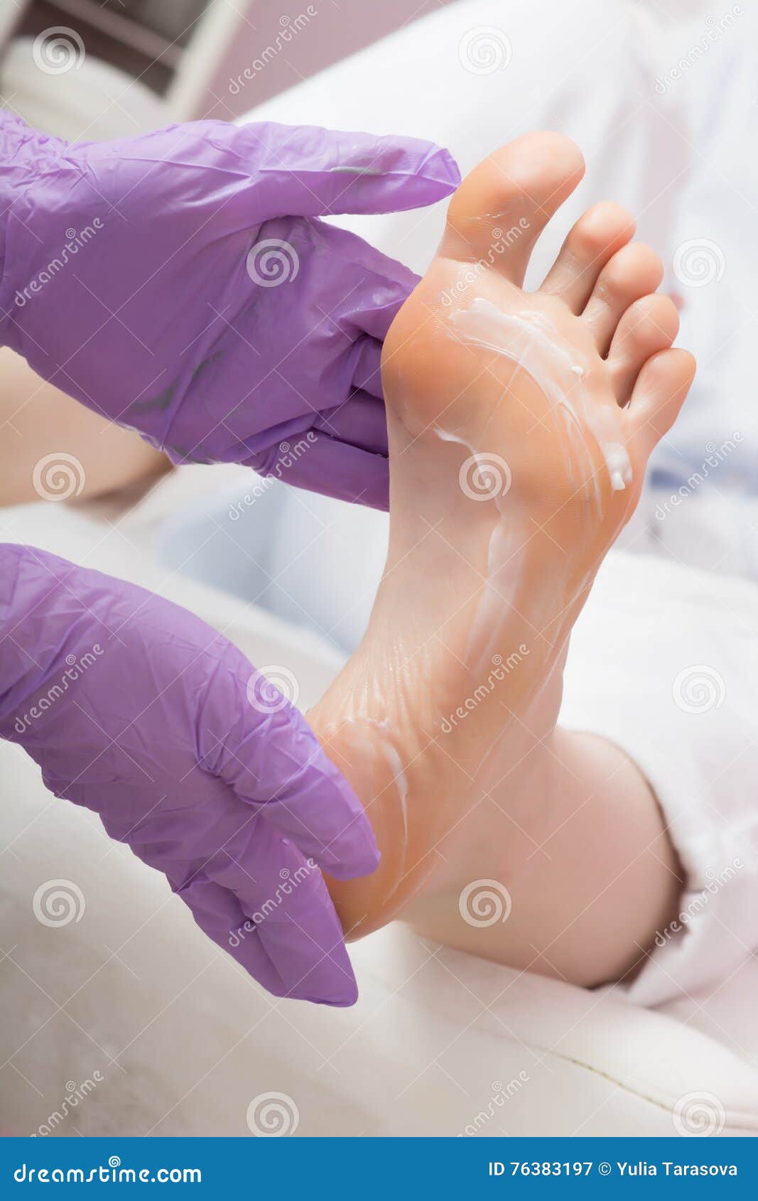 foot care massage with cream. pedicure spa procedure.