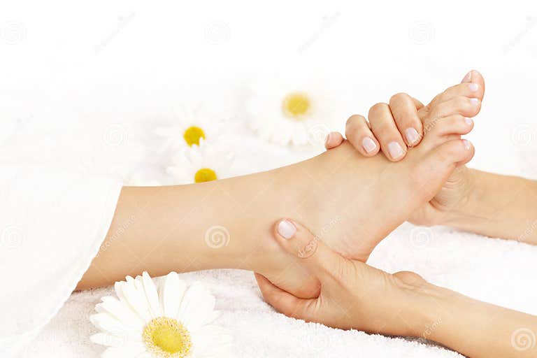 Foot massage stock photo. Image of hand, hands, massaging 21747828