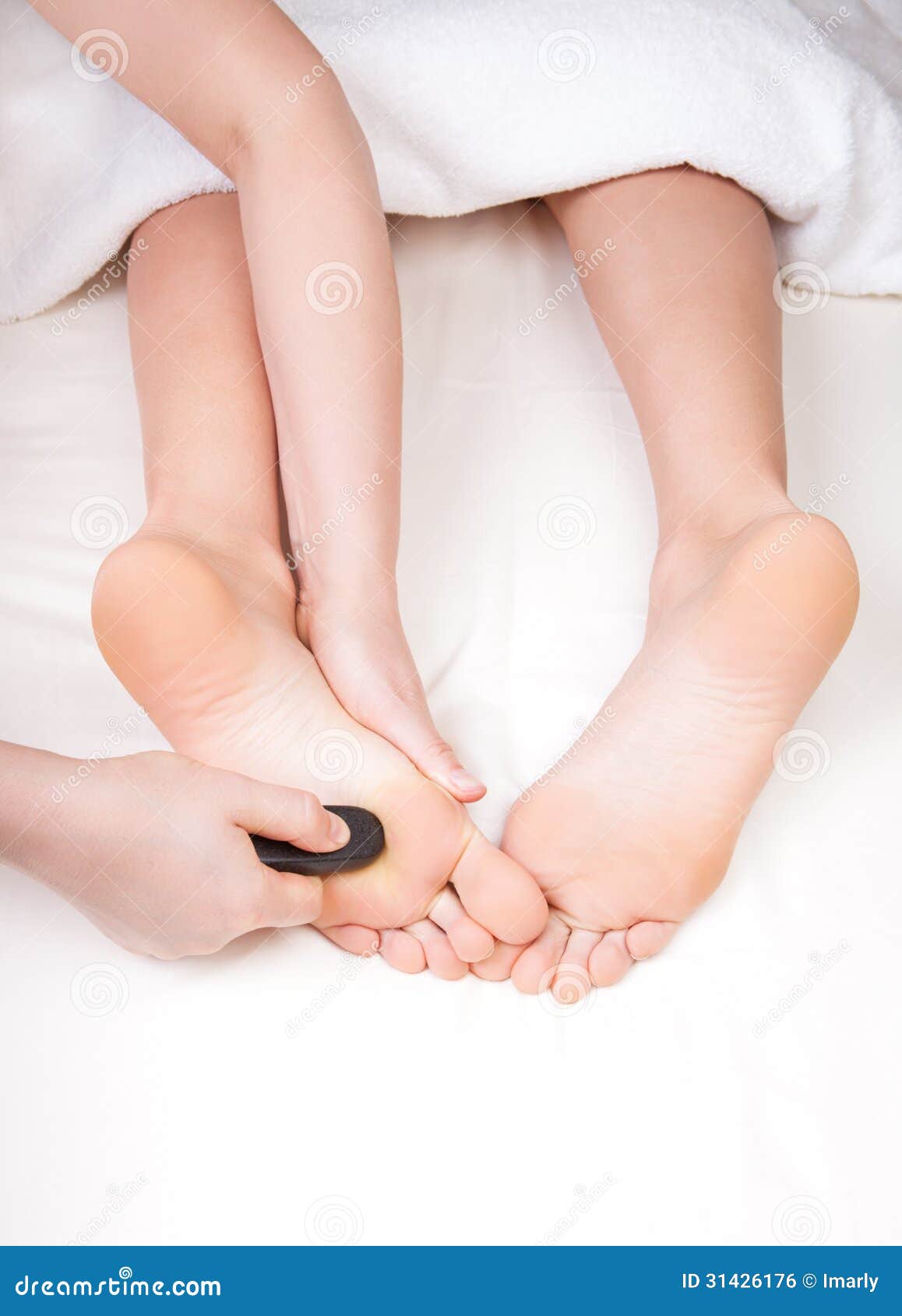 Foot Massage with a Hot Stone Stock Photo Image of footcare, healing