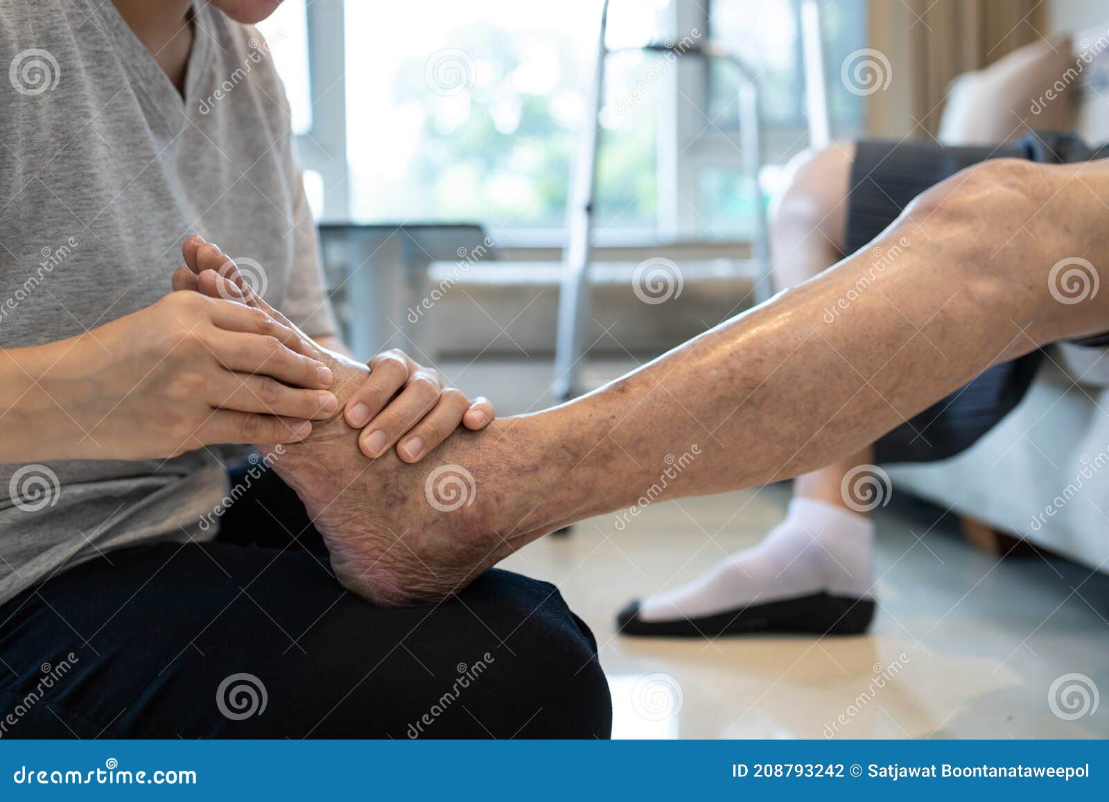 foot massage physical therapy to relieve muscle spasms,massage the tired muscles of senior woman,feet numb from diabetes,old