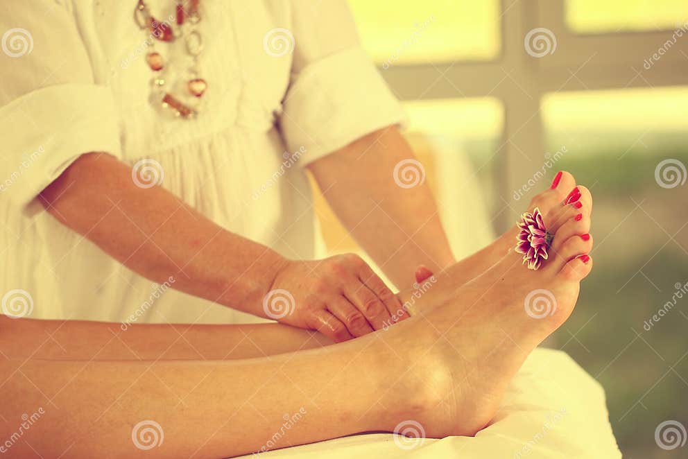 Foot massage in the Spa stock photo. Image of delicate 40075928