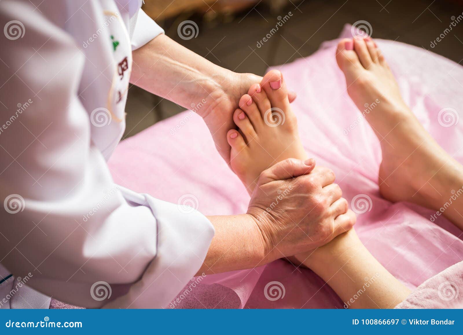 Foot Massage In Spa Salon CloseupYoung Woman Havin