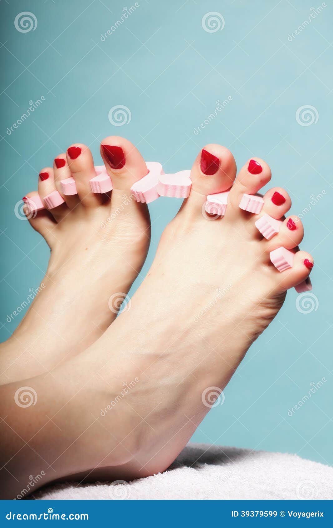 Foot Pedicure Applying Red Toenails on Blue Stock Image - Image of ...