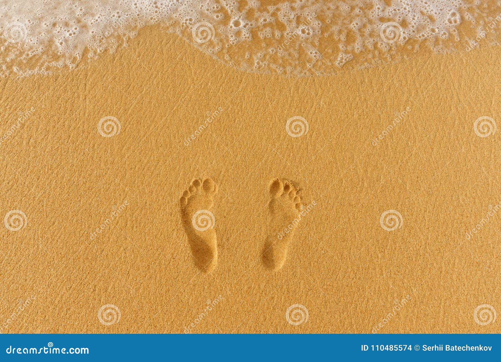 Pair of Footprints in the Sand and Sea Surf Stock Photo Image of