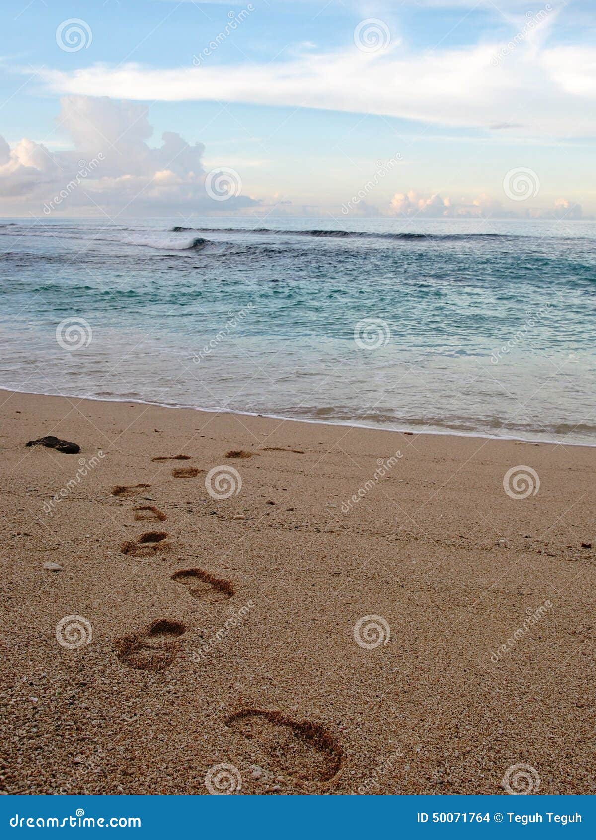 Foot step on sand at bakaro beach, manokwari, west papua.