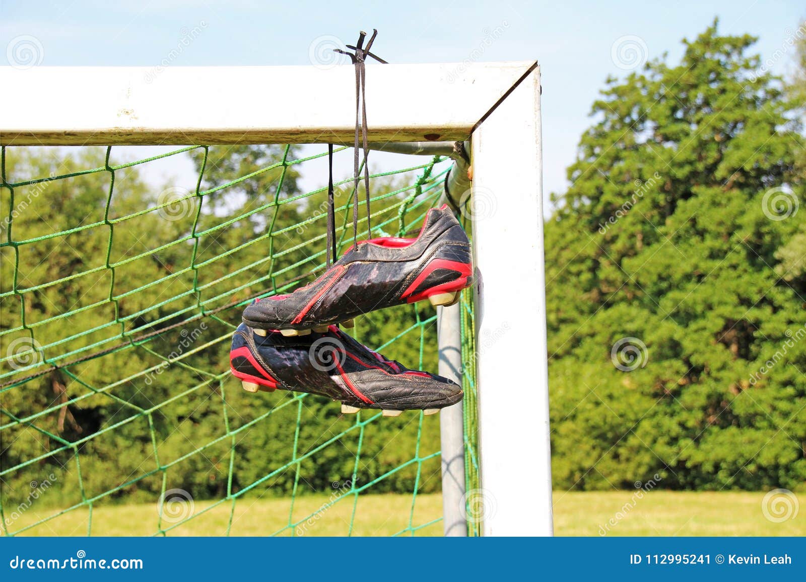 Football Boots Hanging on a Football Post Stock Image Image of sunny