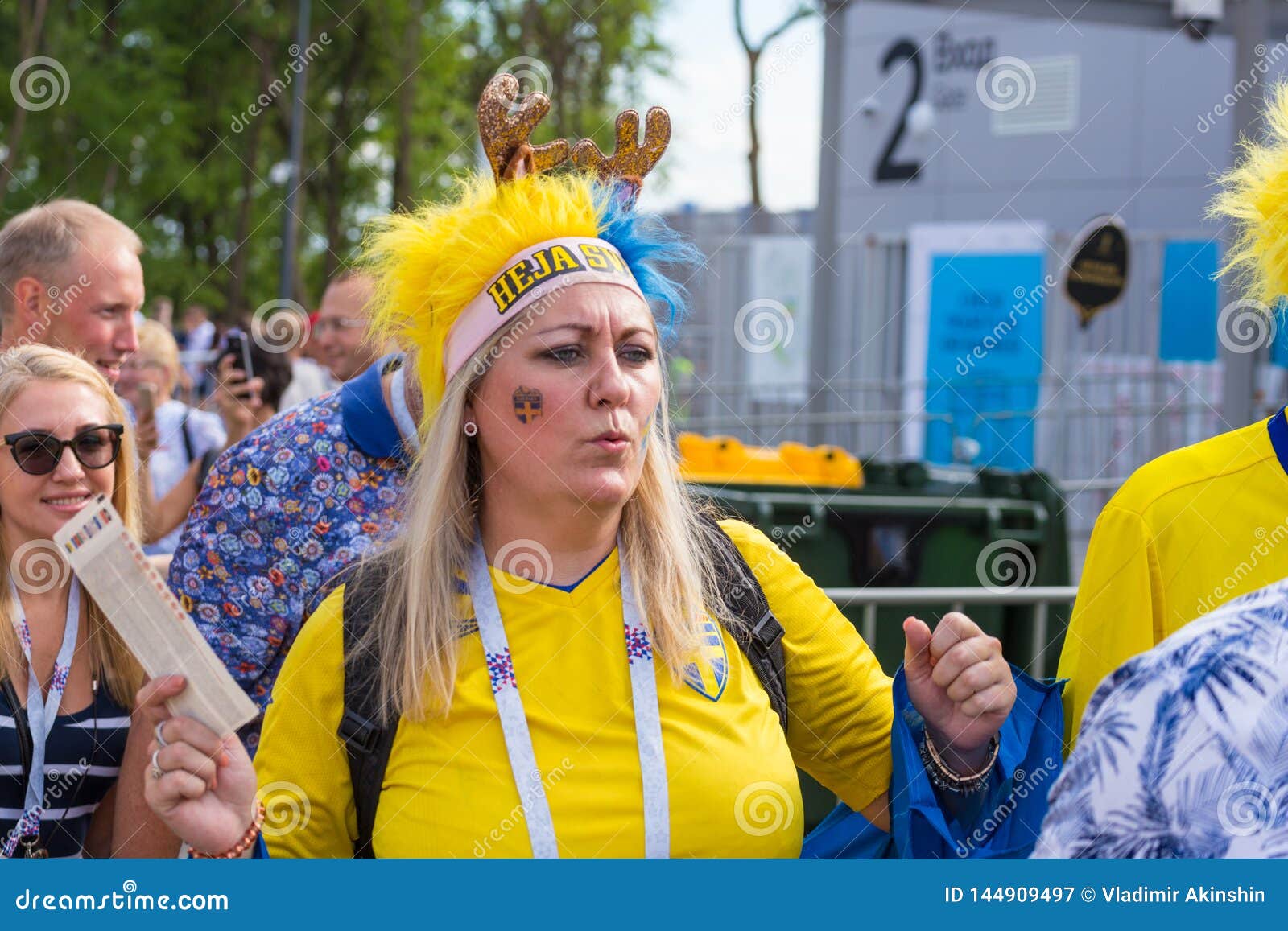 Football Fans From Sweden, Married Couple, With Painted Faces In National Colors Before The ...