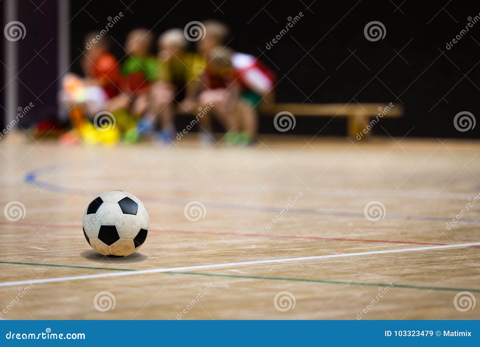 football futsal ball and youth team. indoor soccer sports hall