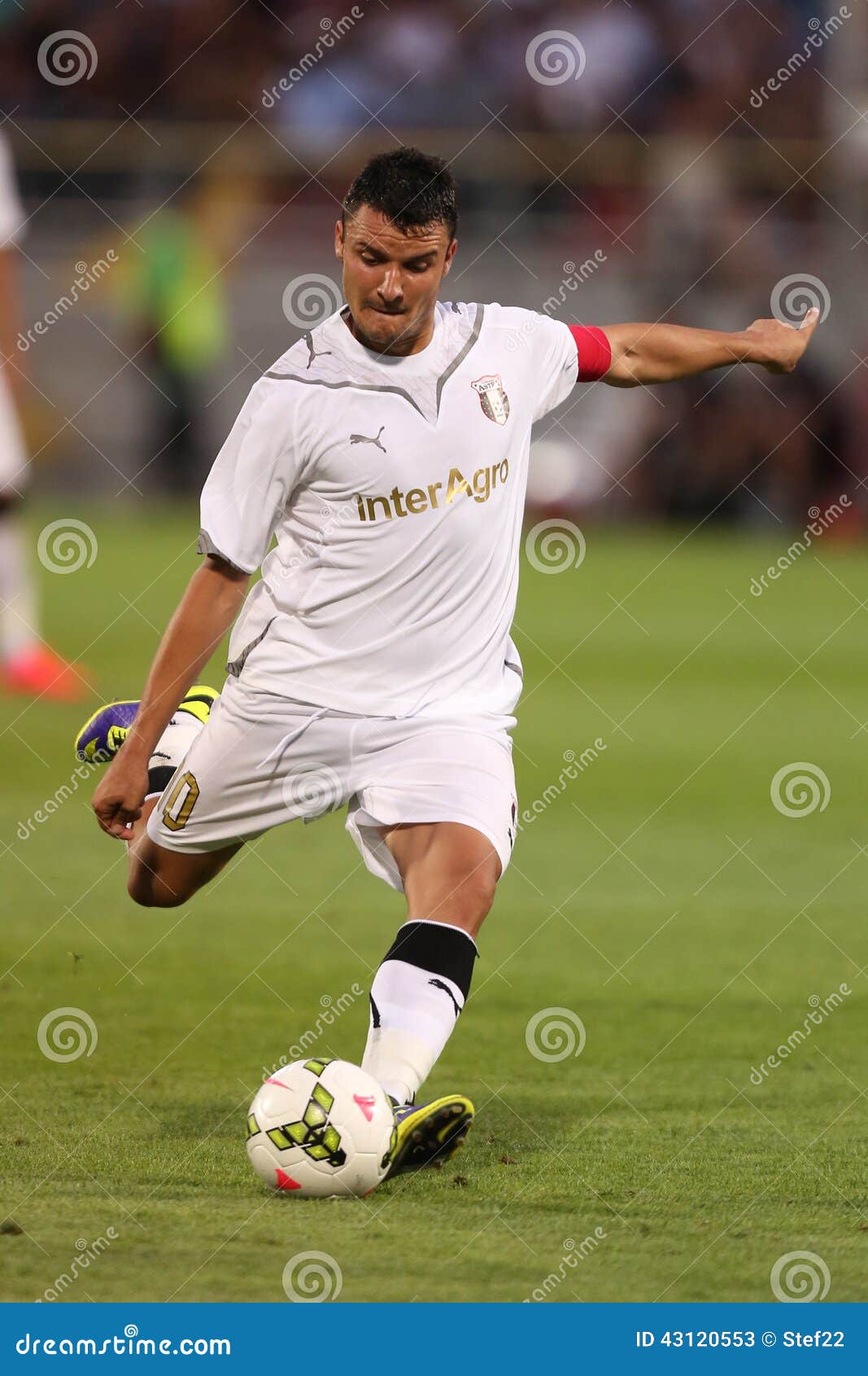 Football Player Kicking Ball Editorial Stock Photo - Image of