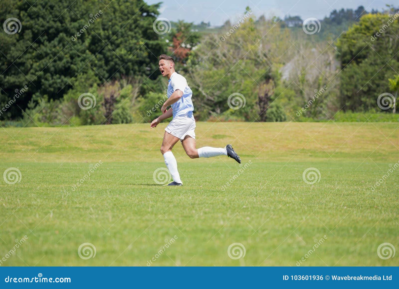 Football Player Playing Soccer in the Ground Stock Photo - Image of