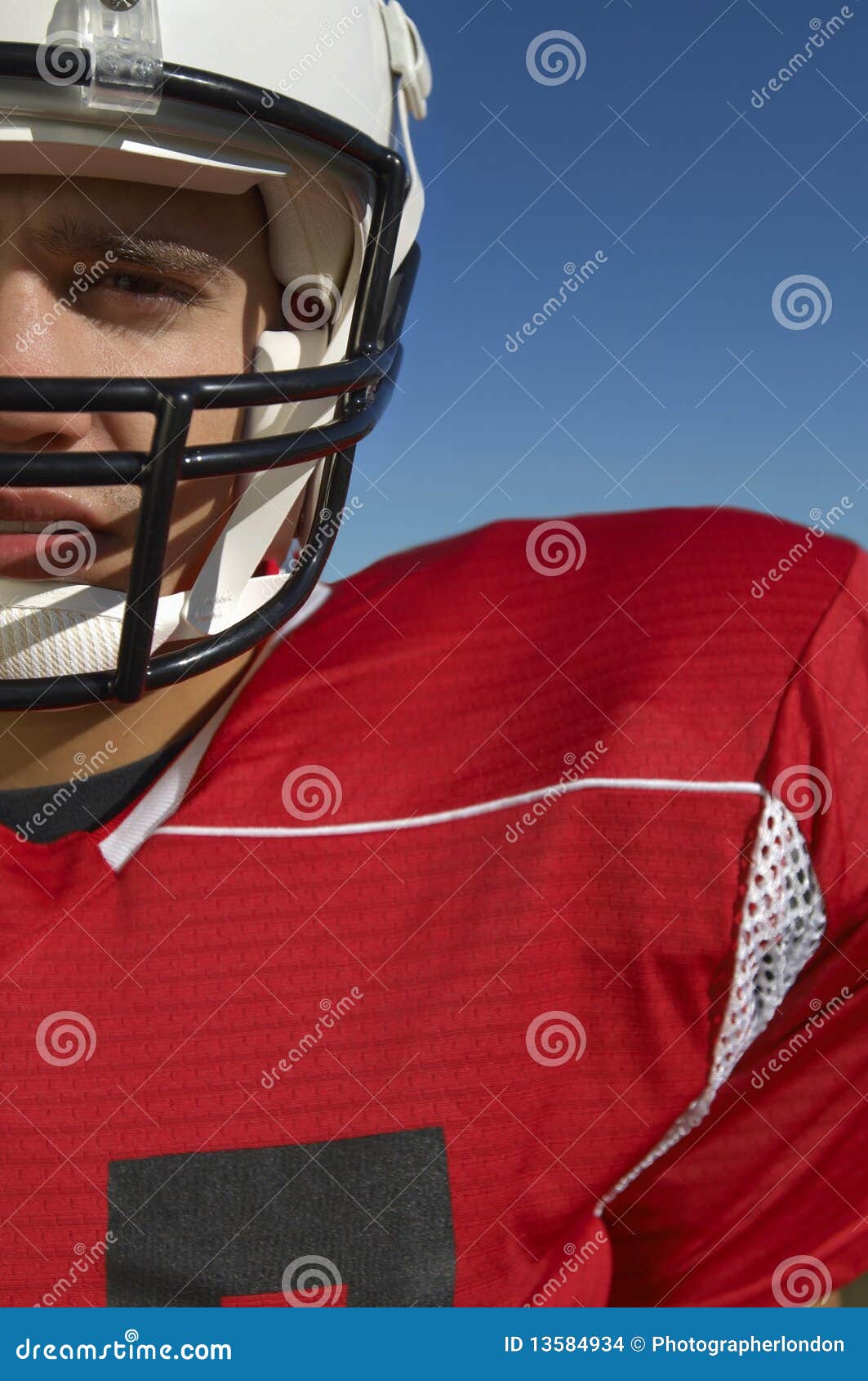 Football Player Wearing Helmet Stock Photo Image of outdoors, pads