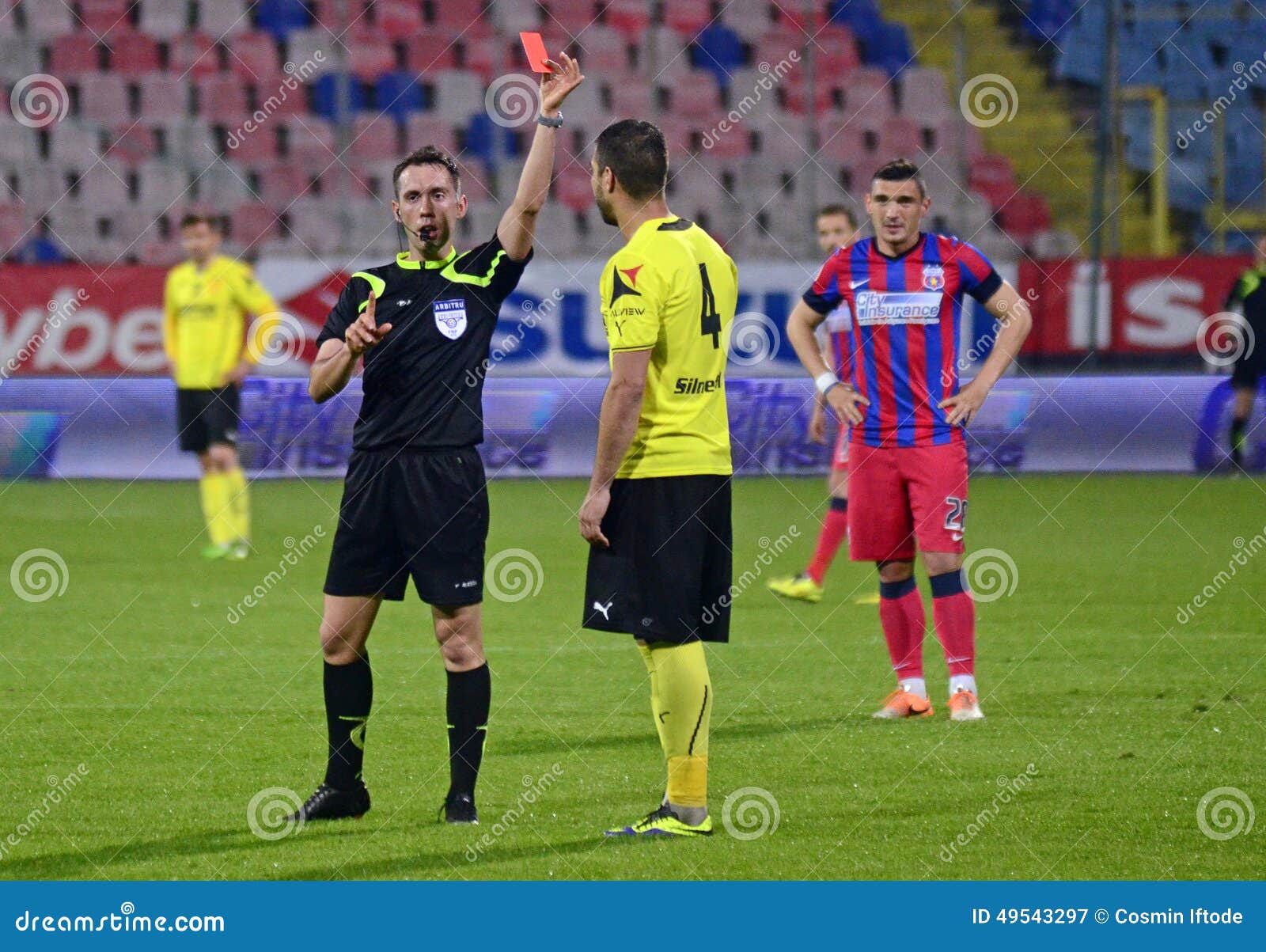 Football referee showing a red card Stock Photo by ©ljsphotography 71174169