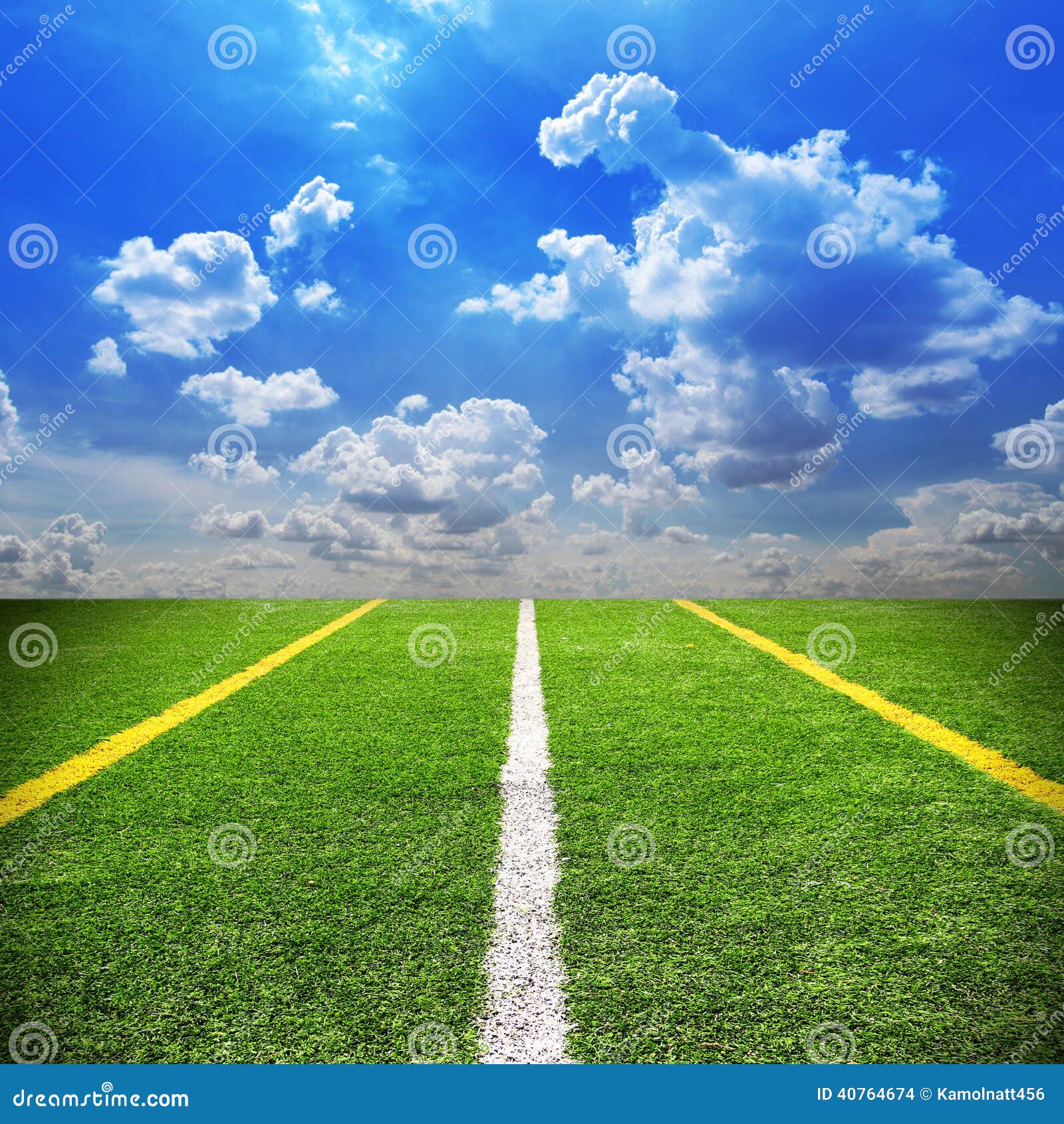 Football And Soccer Field Grass Stadium Blue Sky Background Stock Photo